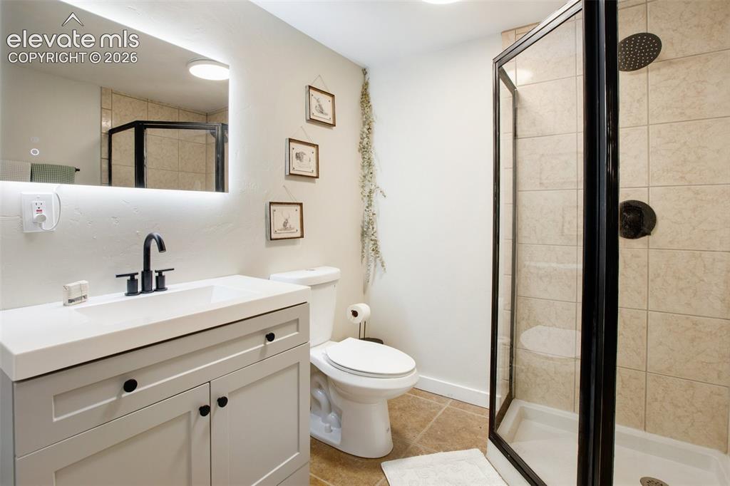 Image 16 of 46: Lower level full bath