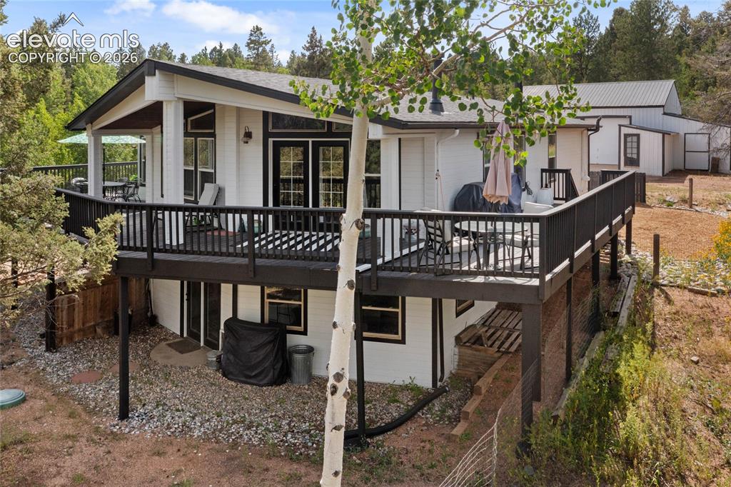 Image 2 of 46: Two levels of living, each with own entrance