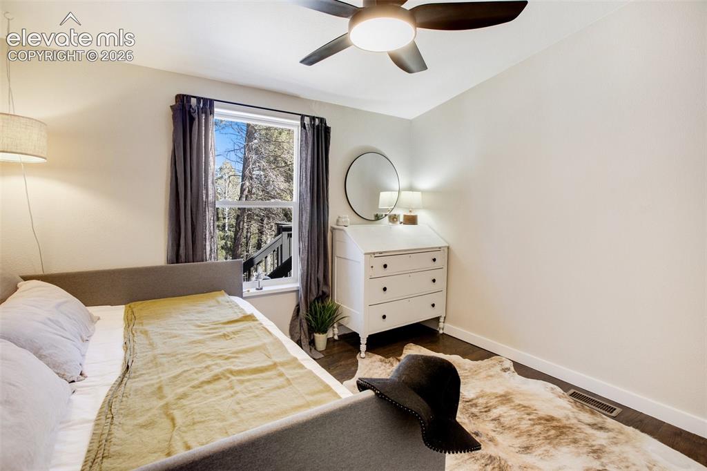 Image 36 of 46: Main level second bedroom