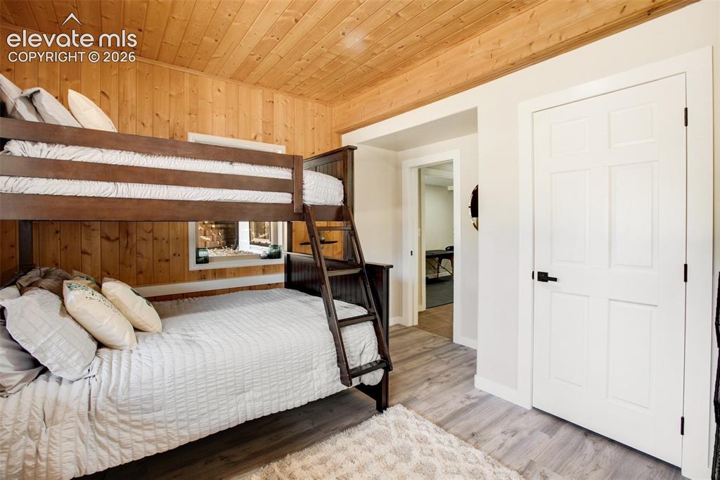 Image 41 of 46: Lower level bunk room
