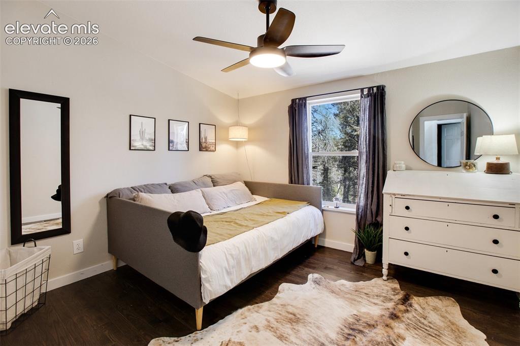 Image 9 of 46: Main level second bedroom