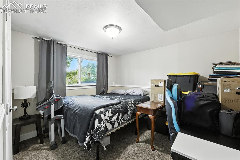 Image 26 of 40: Bedroom in the basement