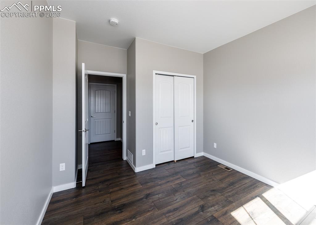Image 30 of 50: Main Level Bedroom