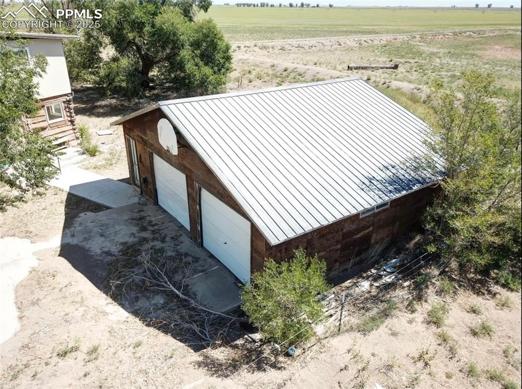 Image 2 of 7: Birds eye view of property with a rural view