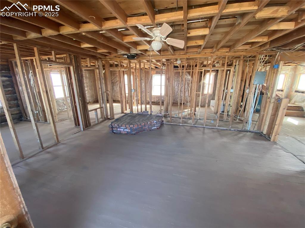 Image 4 of 7: Miscellaneous room with a wealth of natural light and ceiling fan
