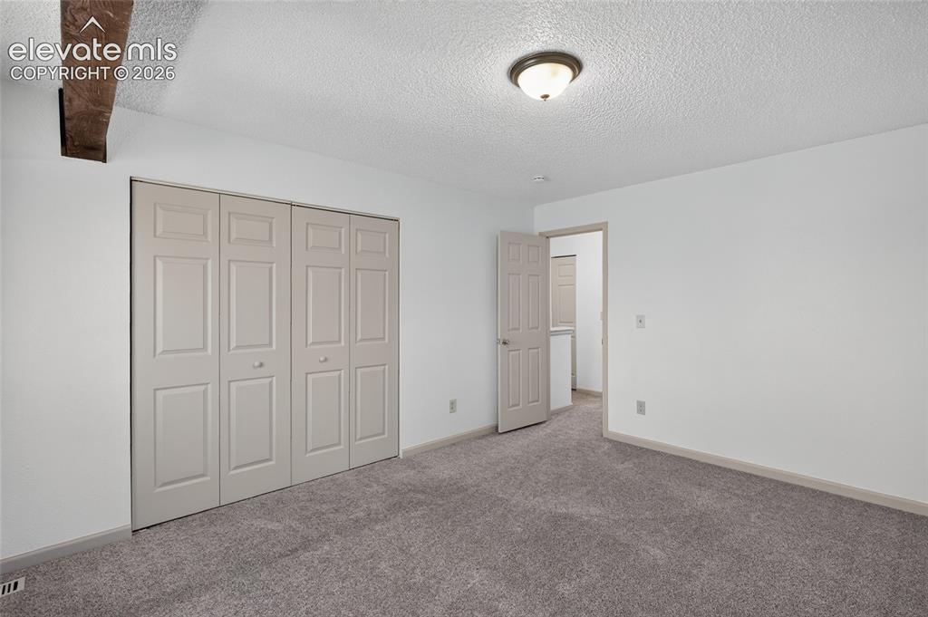 Image 13 of 20: Bedroom
