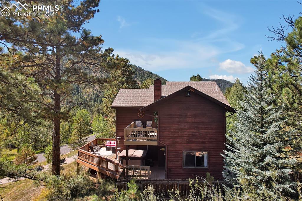Image 35 of 40: Aerial Back View, Yard, Pine Trees,