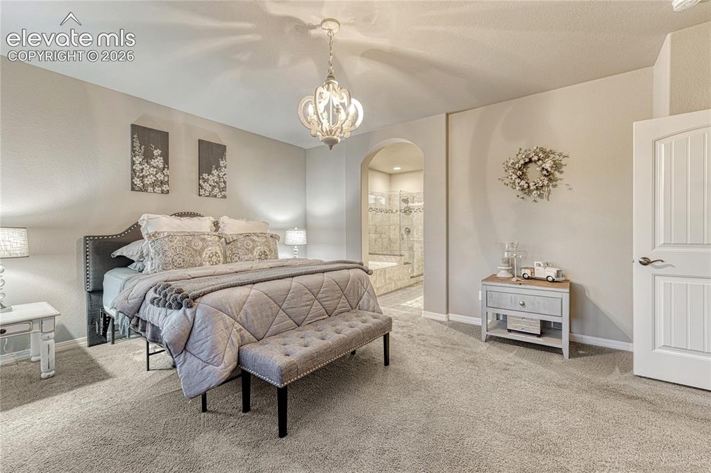 Image 19 of 49: Master Bedroom