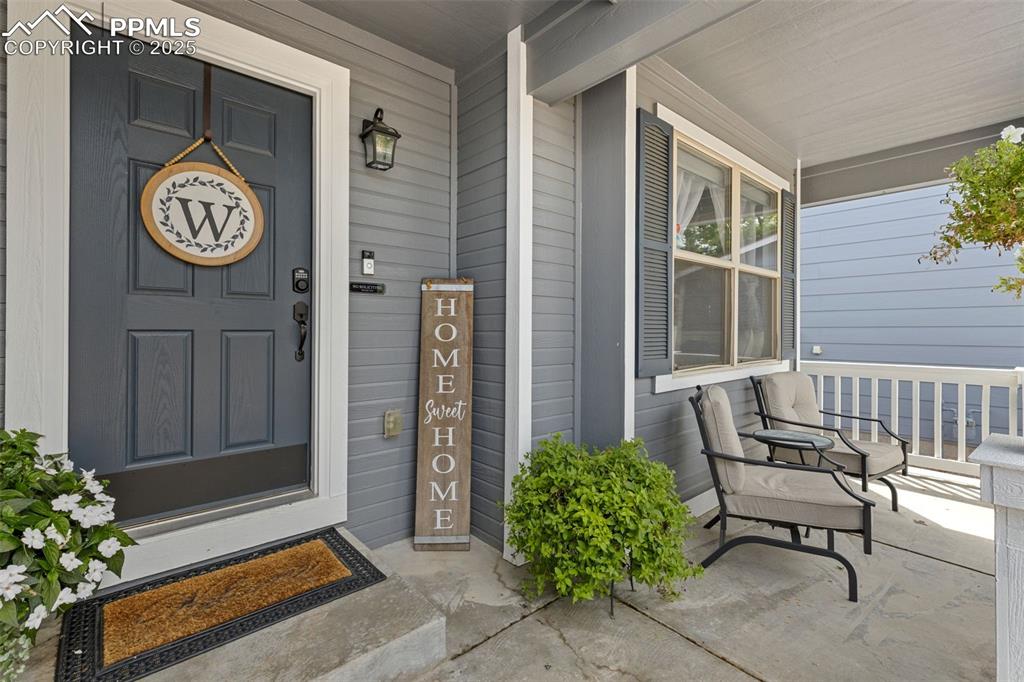 Image 17 of 39: Property entrance with a porch