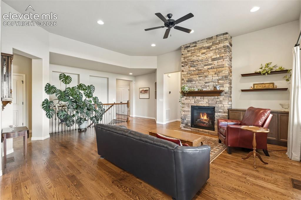 Image 10 of 49: View of living room toward bedrooms and front of house