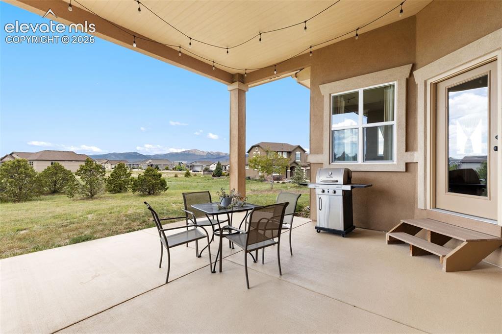 Image 17 of 49: Enjoy your spacious covered patio, already piped with natural gas for conve