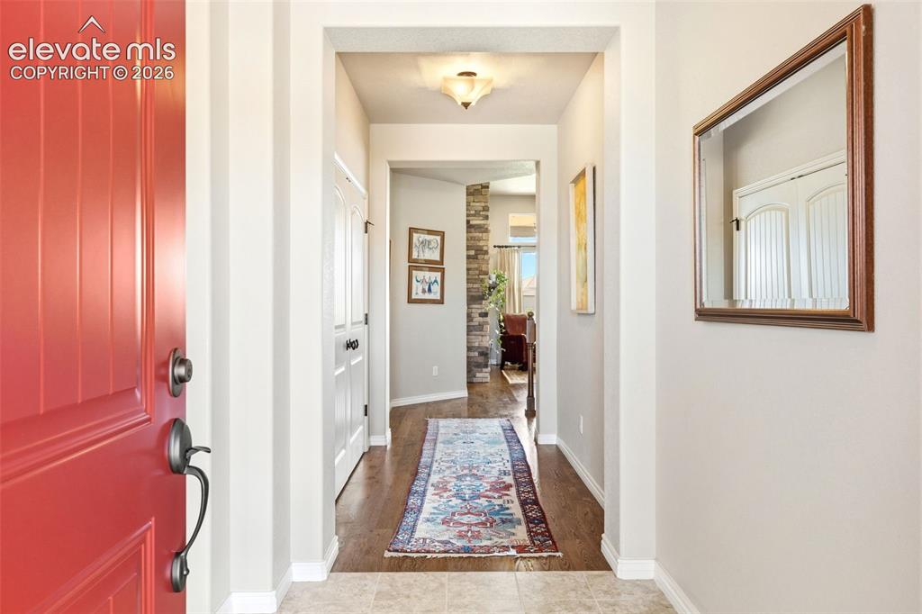 Image 25 of 49: Foyer/entry to home