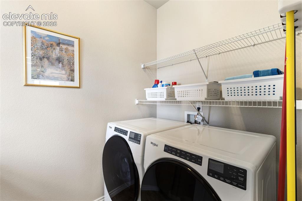 Image 28 of 49: Main floor laundry