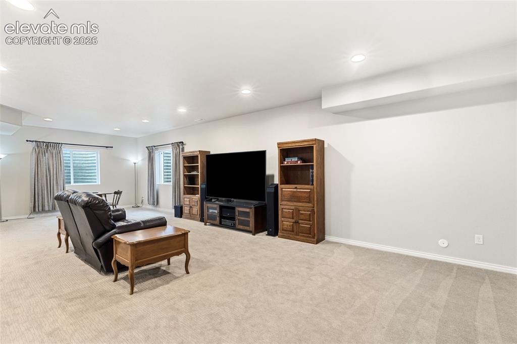 Image 31 of 49: Options abound in this finished basement