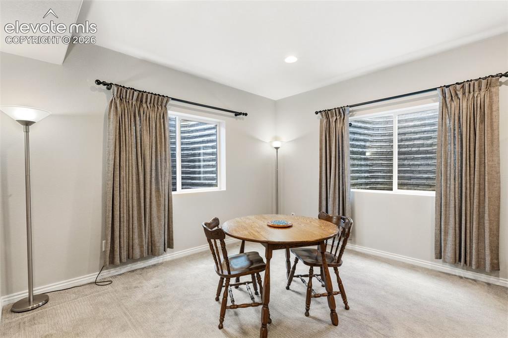 Image 32 of 49: Options abound in this finished basement