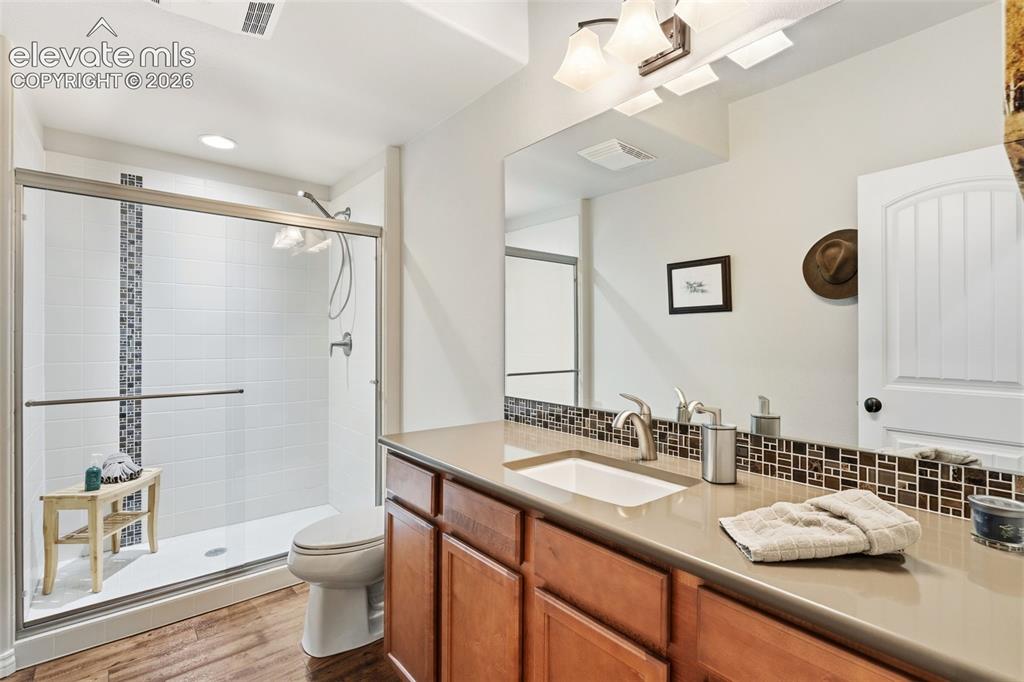 Image 35 of 49: Full bathroom in basement