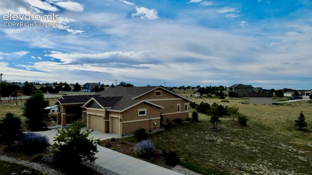 Image 43 of 49: View of house, situated on 1.81-acre lot