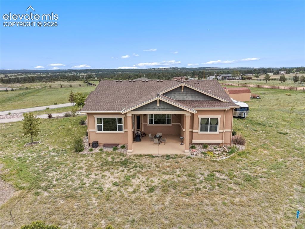 Image 46 of 49: Aerial view of property with Black Forest as backdrop