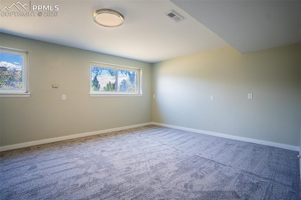 Image 15 of 24: Basement living area
