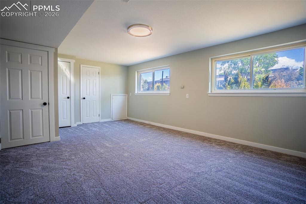 Image 16 of 24: Basement living area