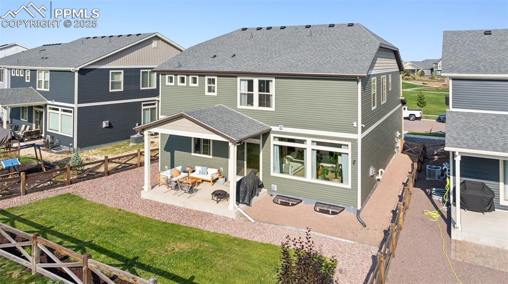 Image 42 of 43: Rear view of property featuring a patio area, a residential view, an outdoo