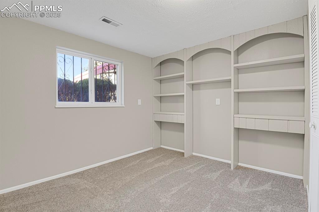 Image 28 of 39: Bedroom