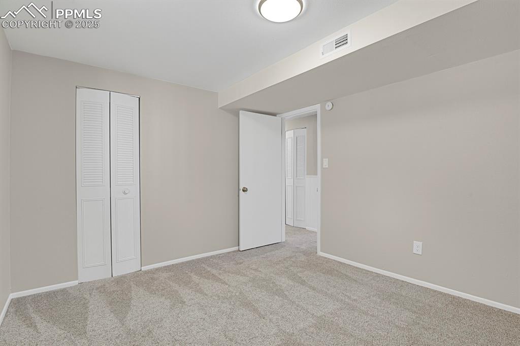 Image 32 of 39: Bedroom