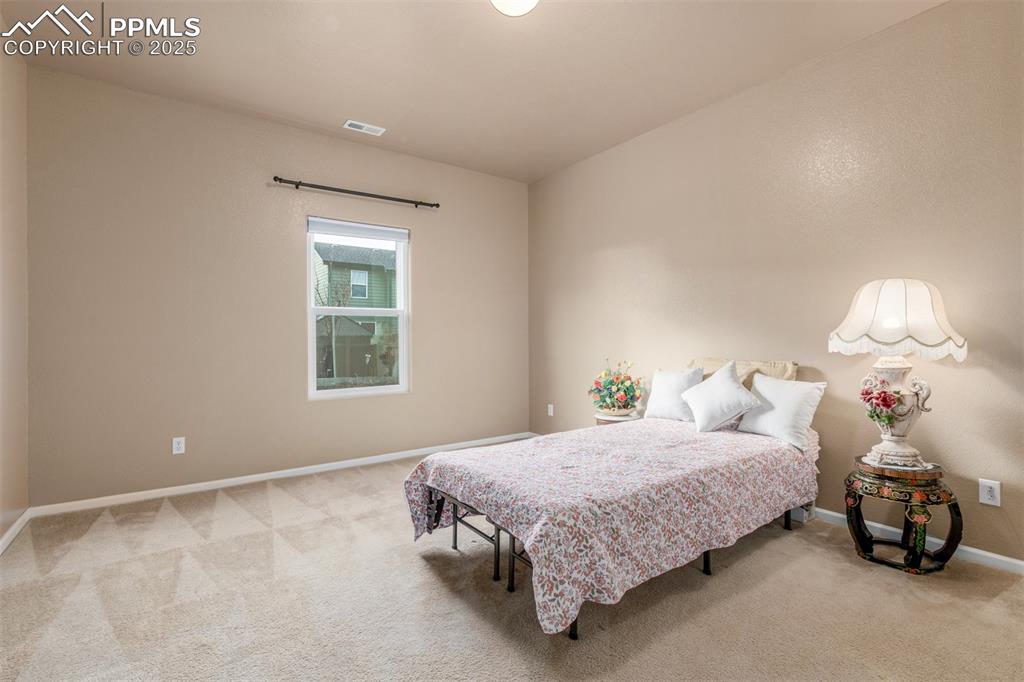 Image 10 of 29: Oversized primary bedroom with en-suite is the perfect escape