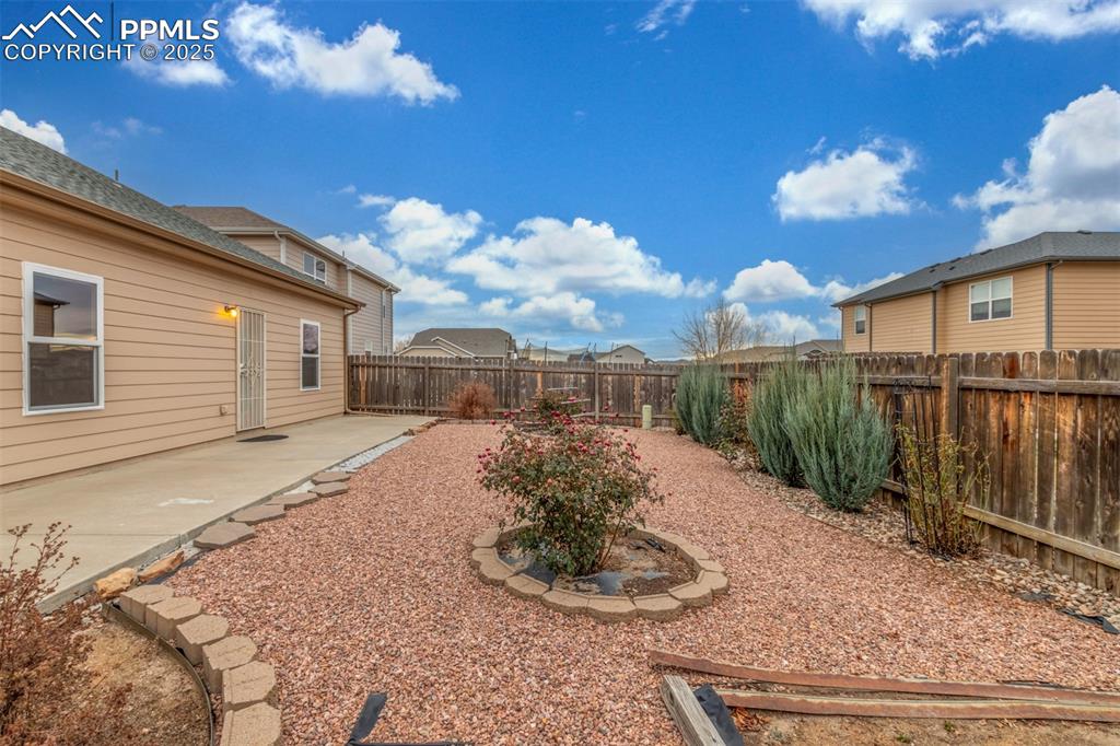 Image 27 of 29: Xeriscaped backyard is very low maintenance