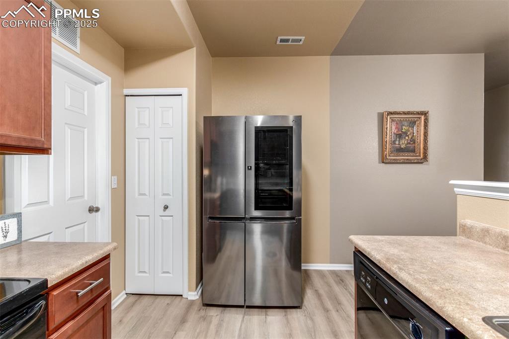 Image 9 of 29: Newer refrigerator stays 