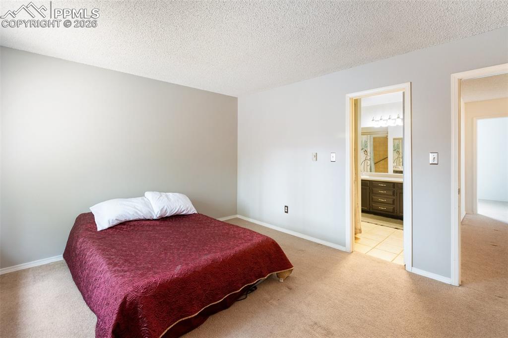 Image 18 of 34: Primary Bedroom