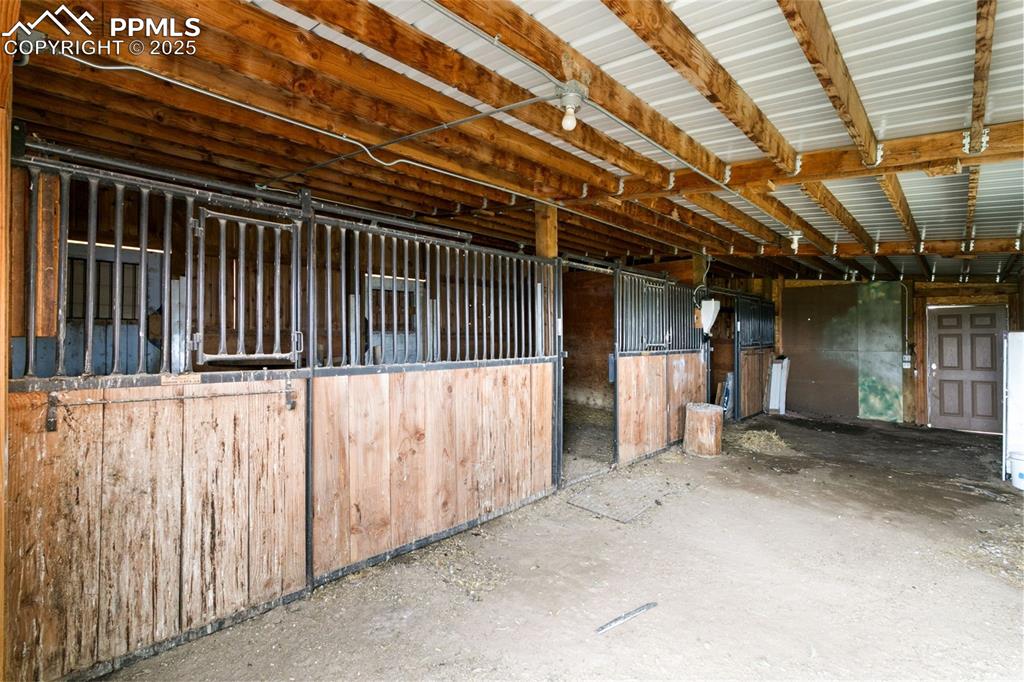 Image 5 of 44: View of horse barn