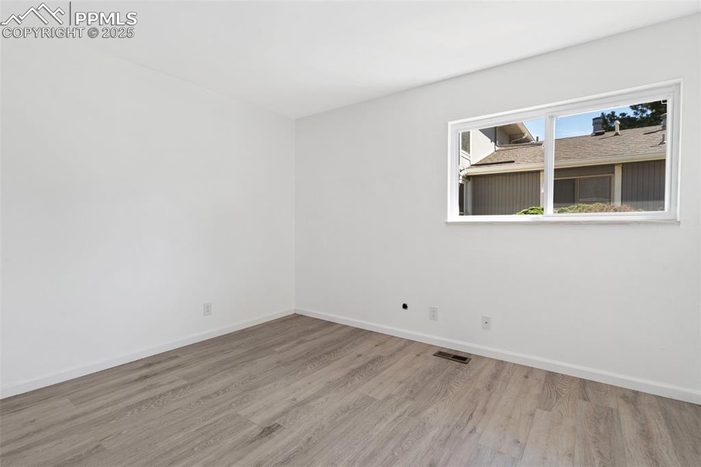 Image 12 of 15: Master bedroom