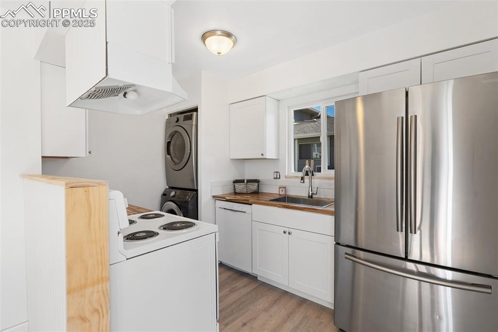 Image 8 of 15: Stackable washer and dryer are included