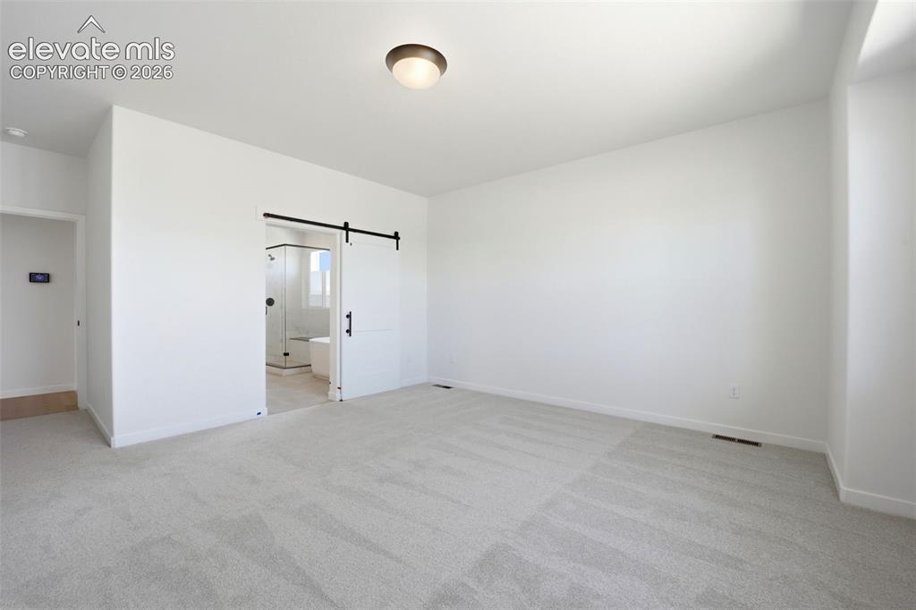 Image 19 of 42: Master Bedroom