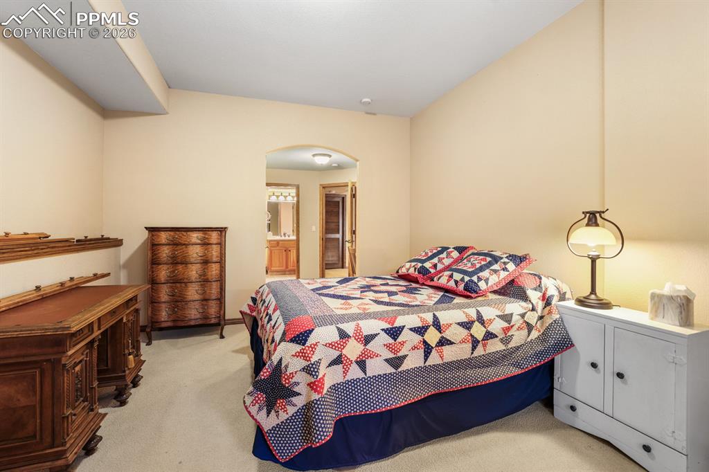 Image 32 of 38: Bedroom