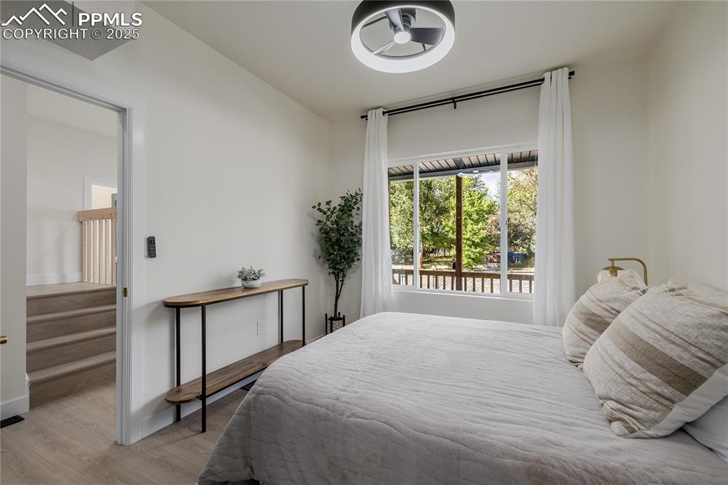 Image 20 of 39: Bedroom featuring light wood-type flooring