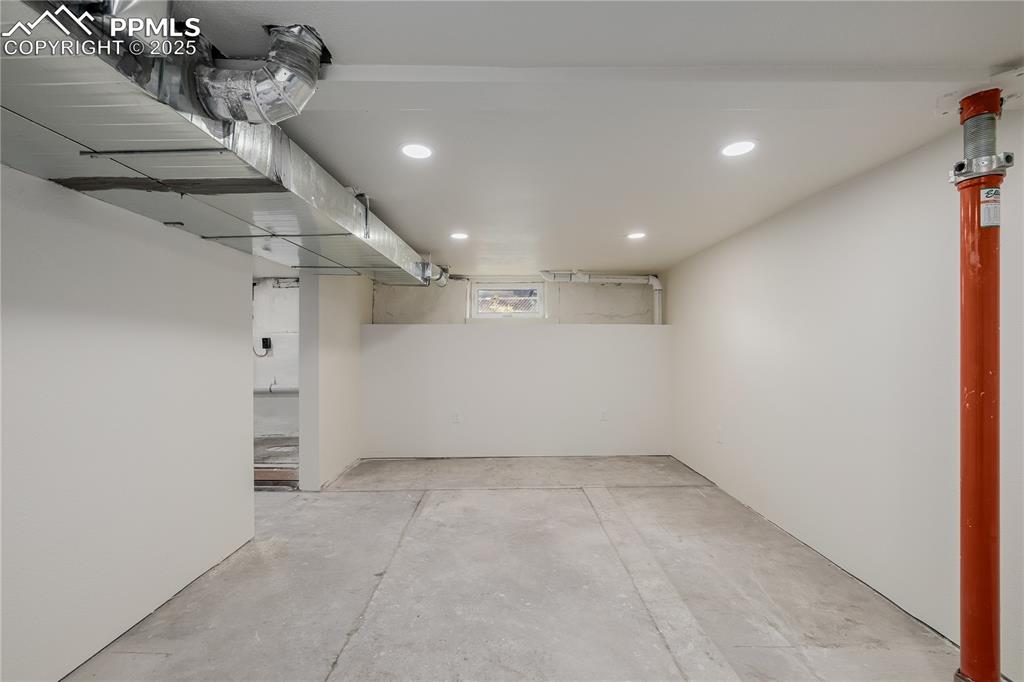 Image 33 of 39: Basement featuring recessed lighting
