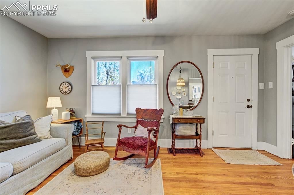 Image 3 of 49: Entryway featuring light wood-type flooring and ceiling fan