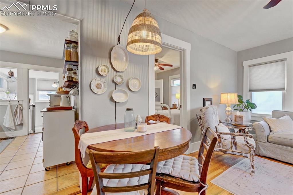 Image 9 of 49: Dining room featuring ceiling fan and baseboards