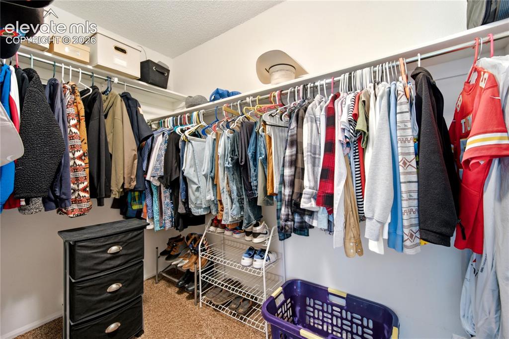 Image 23 of 49: Primary Closet