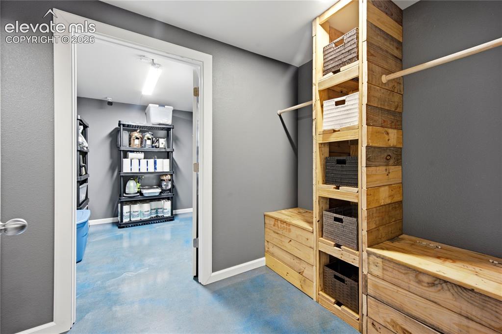 Image 34 of 49: Bedroom Closet