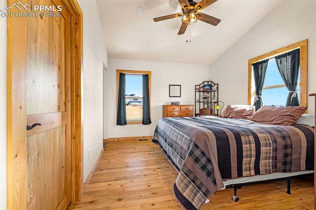 Image 11 of 49: Main floor primary bedroom