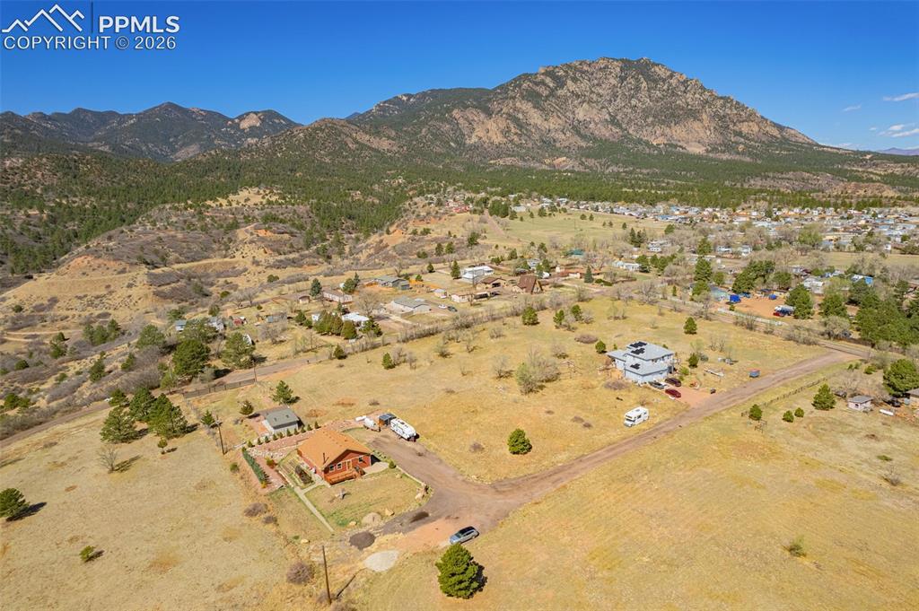 Image 35 of 50: Overview of rural landscape with a mountainous background