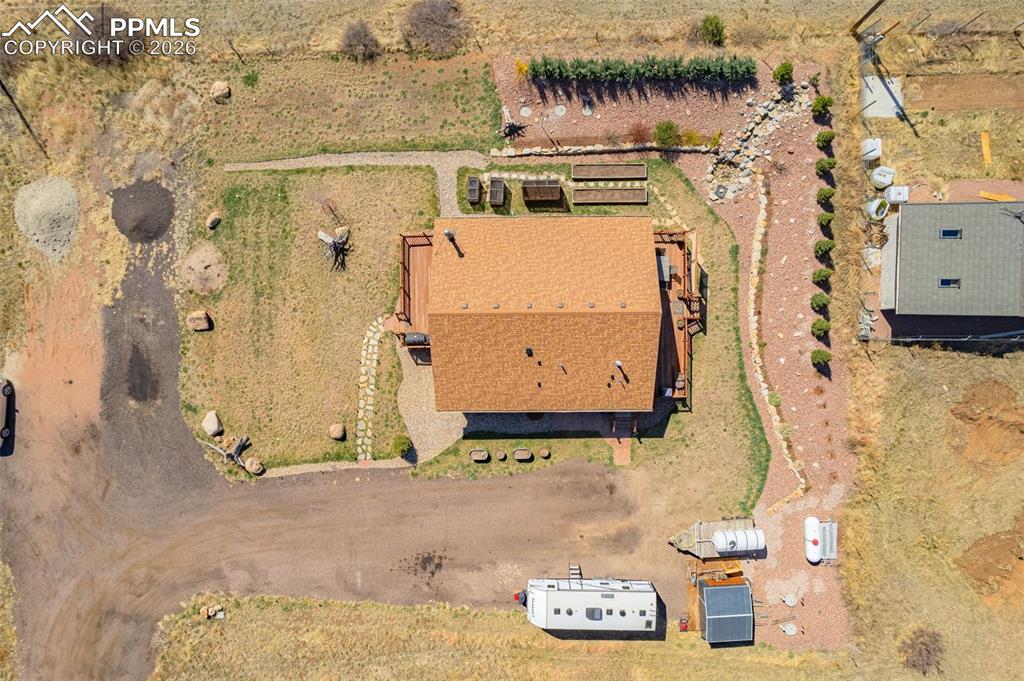 Image 40 of 49: Aerial overview of property