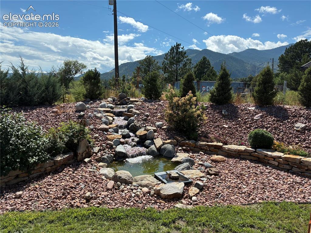 Image 47 of 50: Summer 2025 view of the water feature