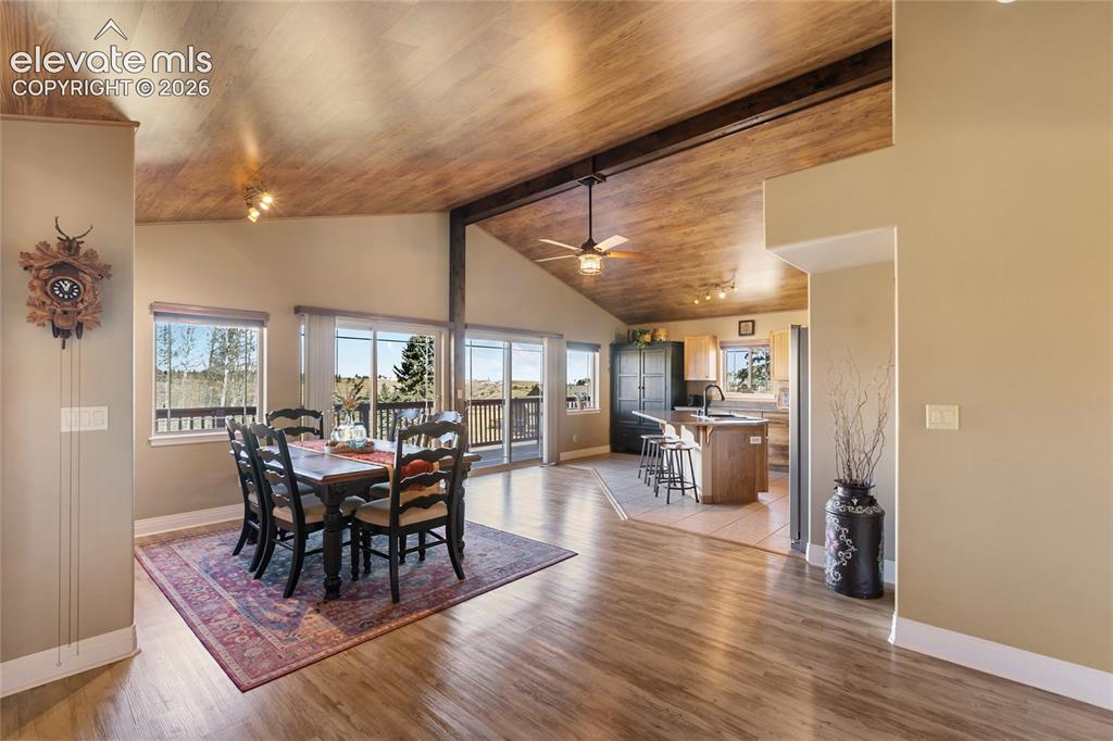 Image 10 of 30: I love how the kitchen and dining areas open up to one another...and the go