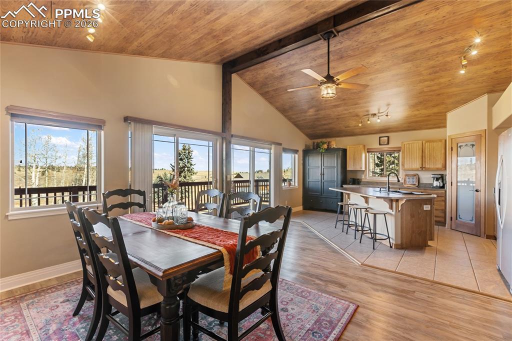 Image 16 of 33: Take a look at this space, and the double walk out to the rear deck and the