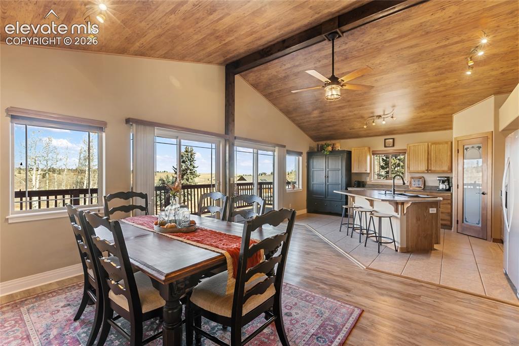 Image 8 of 30: Take a look at this space, and the double walk out to the rear deck and the