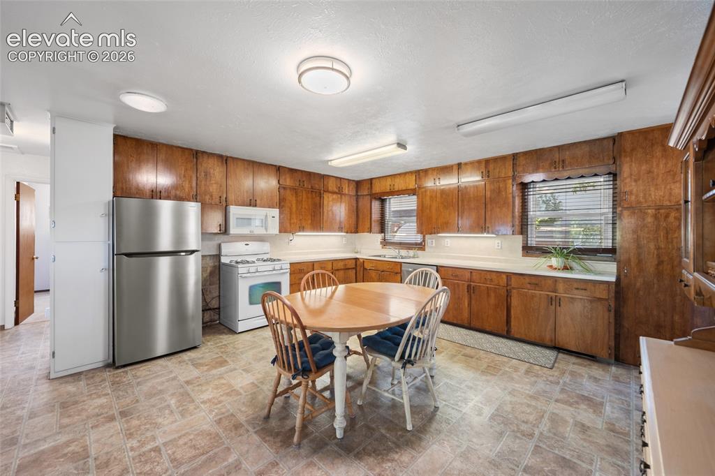 Image 13 of 41: Kitchen with Gas Stove